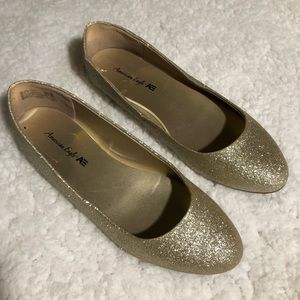 Gold glittery flats